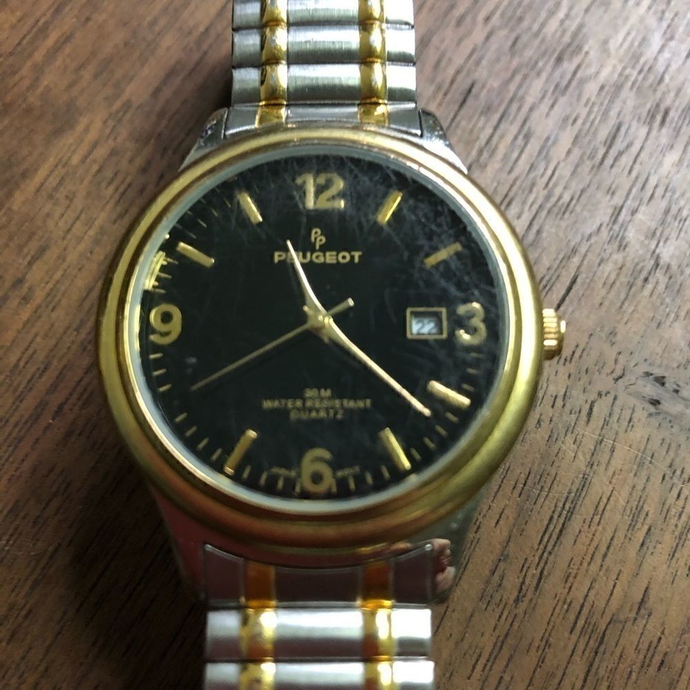 Men’s Peugeot Watch in Silver and Gold. GUC